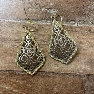 Kendra Scott earrings. Silver interior lined with gold rim